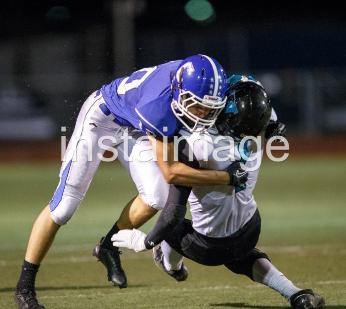 Carson's Brandon Gagnon putting a hit on a receiver